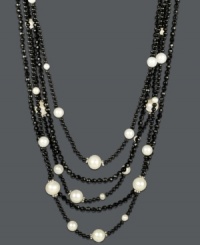 A sleek silhouette. Jet black onyx (204-1/3 ct. t.w.) and white cultured freshwater pearls (4 mm, 7 mm, and 9 mm) alternate to create a standout look. Clasp and bead accents crafted in sterling silver. Approximate length: 17 inches + 3-inch extender. A sleek silhouette. Jet black onyx (204-1/3 ct. t.w.) and white cultured freshwater pearls (4 mm, 7 mm, and 9 mm) alternate to create a standout look. Clasp and bead accents crafted in sterling silver. Approximate length: 17 inches + 3-inch extender.