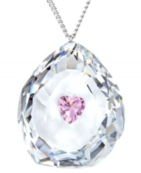 It all comes down to matters of the heart. Swarovski's romantic style features a clear crystal drop with a sparkling pink heart at center. Set in silver tone mixed metal. Approximate length: 23 inches. Approximate drop: 1-1/5 inches.