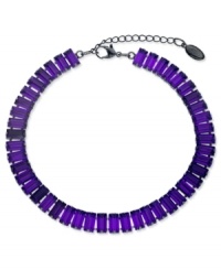 Vibrant in violet. This choker necklace from GUESS features baguette-cut amethyst crystals for a bright touch. Crafted in hematite tone mixed metal. Approximate length: 12-1/2 inches + 2-inch extender.