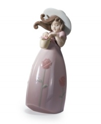Little Rose wears a pink dress to match her basket of blooms in this darling collectible, handcrafted in Lladro porcelain. Little Rose wears a pink dress to match her basket of blooms in this darling collectible, handcrafted in Lladro porcelain.