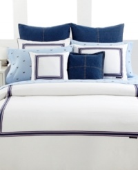 Classic style, totally Tommy. Boasting pure white cotton embellished with navy, white and red striping, the White Oxford duvet cover gives your bed a polished look with a preppy edge. Featuring a striped reverse; mitered corner stitching; button closure. Classic style, totally Tommy. Boasting pure white cotton embellished with navy, white and red striping, the White Oxford duvet cover gives your bed a polished look with a preppy edge. Featuring a striped reverse; mitered corner stitching; button closure.