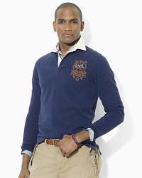 Engrained in athletic heritage, a trim-fitting rugby shirt is crafted from soft, washed cotton jersey with an embroidered crest for well-worn, authentic style Engrained in athletic heritage, a trim-fitting rugby shirt is crafted from soft, washed cotton jersey with an embroidered crest for well-worn, authentic style