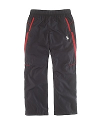 A performance-driven pant is constructed from lightweight taffeta with sporty stripes at the sides and Ralph Lauren's iconic pony at the left hip. A performance-driven pant is constructed from lightweight taffeta with sporty stripes at the sides and Ralph Lauren's iconic pony at the left hip.