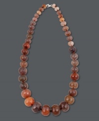 Light your look on fire! Avalonia Road's hot orange fire agate necklace (138-1/3 ct. t.w.) features a graduated design that highlights the neckline. Clasp crafted in sterling silver. Approximate length: 21 inches. Light your look on fire! Avalonia Road's hot orange fire agate necklace (138-1/3 ct. t.w.) features a graduated design that highlights the neckline. Clasp crafted in sterling silver. Approximate length: 21 inches.