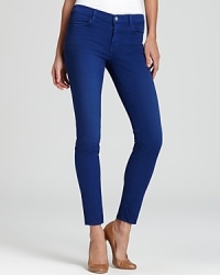 The denim blue dial gets cranked to full blast on these J Brand jeans in a bold indigo hue. Raised whiskering and a skinny fit compliment this cool color. The denim blue dial gets cranked to full blast on these J Brand jeans in a bold indigo hue. Raised whiskering and a skinny fit compliment this cool color.