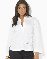 A crisp cotton poplin tunic is accented with a rope belt at the waist for nautical-inspired style.