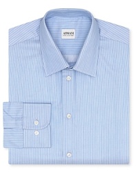 The white stripes bring classic nuance to this modern dress shirt from Armani. The white stripes bring classic nuance to this modern dress shirt from Armani.