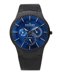 Signature Skagen Denmark details accent this titanium-tough watch design. Black stainless steel bracelet and round black-plated titanium case. Blue dial features applied silver tone stick indices, minute track, three multifunctional subdials, luminous hands and logo. Quartz movement. Water resistant to 30 meters. Limited lifetime warranty. Signature Skagen Denmark details accent this titanium-tough watch design. Black stainless steel bracelet and round black-plated titanium case. Blue dial features applied silver tone stick indices, minute track, three multifunctional subdials, luminous hands and logo. Quartz movement. Water resistant to 30 meters. Limited lifetime warranty.
