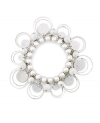 Beautiful beaded embellishment enhances the look of Style&co.'s stretch bracelet, which can adjust to fit nearly any wrist. Crafted in silver tone mixed metal. Approximate diameter: 2-1/4 inches. Beautiful beaded embellishment enhances the look of Style&co.'s stretch bracelet, which can adjust to fit nearly any wrist. Crafted in silver tone mixed metal. Approximate diameter: 2-1/4 inches.