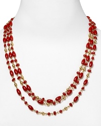 Pile on the pretty with this multi strand necklace from Lauren Ralph Lauren. It's bold coral beads and gleaming links will add statement shine to every outfit. Pile on the pretty with this multi strand necklace from Lauren Ralph Lauren. It's bold coral beads and gleaming links will add statement shine to every outfit.