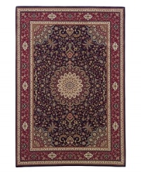 A beautiful example of an ancient Persian ardebil carpet, this rug features a medallion design ringed with tiny flowers. A deep navy ground exquisitely offsets the springlike palette of yellows, blues, greens and purples. A beautiful example of an ancient Persian ardebil carpet, this rug features a medallion design ringed with tiny flowers. A deep navy ground exquisitely offsets the springlike palette of yellows, blues, greens and purples.