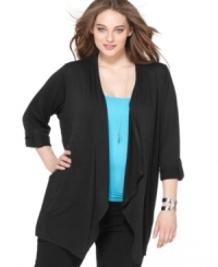 Add a relaxed layer to your look with Style&co.'s three-quarter sleeve plus size cardigan, punctuated by a handkerchief hem. Add a relaxed layer to your look with Style&co.'s three-quarter sleeve plus size cardigan, punctuated by a handkerchief hem.
