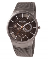 Titanium strength, Skagen Denmark style. This watch features a mesh titanium bracelet and round stainless steel case. Gray carbon fiber dial with silvertone stick indices, logo and three subdials. Quartz movement. Water resistant to 30 meters. Limited lifetime warranty. Titanium strength, Skagen Denmark style. This watch features a mesh titanium bracelet and round stainless steel case. Gray carbon fiber dial with silvertone stick indices, logo and three subdials. Quartz movement. Water resistant to 30 meters. Limited lifetime warranty.