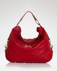 When the cool girl ventures out by day, our bets are on this killer Rebecca Minkoff leather hobo, which works enough slouchy cool to get her to the bodega and back. When the cool girl ventures out by day, our bets are on this killer Rebecca Minkoff leather hobo, which works enough slouchy cool to get her to the bodega and back.
