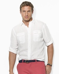 Cut for a comfortable, classic fit, a versatile roll-sleeve sport shirt is crafted from soft, washed linen with military-inspired details. Cut for a comfortable, classic fit, a versatile roll-sleeve sport shirt is crafted from soft, washed linen with military-inspired details.
