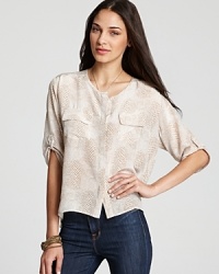 Slip into this silk Amanda Uprichard snakeskin-print top, designed with the season's high/low hem, that slinks between office lunches and Saturday brunches when paired with sleek LBPs. Slip into this silk Amanda Uprichard snakeskin-print top, designed with the season's high/low hem, that slinks between office lunches and Saturday brunches when paired with sleek LBPs.