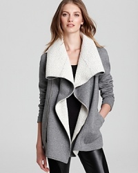 This goes-with-anything Sachin + Babi jacket incorporates all the key trends of the season. From the oversized collar to the high-low hem and draping front, you'll love all the details that make this sweater jacket anything but ordinary. This goes-with-anything Sachin + Babi jacket incorporates all the key trends of the season. From the oversized collar to the high-low hem and draping front, you'll love all the details that make this sweater jacket anything but ordinary.