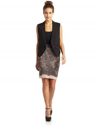 THE LOOKNotched lapelsOne-button frontSleevelessFaux front pocketsDraped front pocketsTHE FITAbout 20 from shoulder to hemTHE MATERIAL65% rayon/30% nylon/5% spandexFully linedCARE & ORIGINDry cleanImportedModel shown is 5'8 (172½cm) wearing US size Small. THE LOOKNotched lapelsOne-button frontSleevelessFaux front pocketsDraped front pocketsTHE FITAbout 20 from shoulder to hemTHE MATERIAL65% rayon/30% nylon/5% spandexFully linedCARE & ORIGINDry cleanImportedModel shown is 5'8 (172½cm) wearing US size Small.