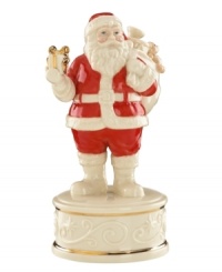 Enjoy the sights and sounds of Christmas. This musical figurine stars a classic Santa Claus on a pedestal of ivory porcelain with red, gold and beautiful scrolling detail. Plays Up On the Roof Top. Enjoy the sights and sounds of Christmas. This musical figurine stars a classic Santa Claus on a pedestal of ivory porcelain with red, gold and beautiful scrolling detail. Plays Up On the Roof Top.