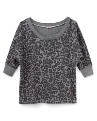 Capturing a casual glamour she'll love, this off-the-shoulder top ties up the look with a colorful leopard print and banded 3/4 sleeves. Capturing a casual glamour she'll love, this off-the-shoulder top ties up the look with a colorful leopard print and banded 3/4 sleeves.