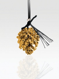 Other than its golden gleam, this pretty pine cone is remarkably realistic, complete with a wispy fringe of pine needles with a dark oxidized finish.HandmadeGoldplated and oxidizedAbout 4.5H X 3.5W.Imported Other than its golden gleam, this pretty pine cone is remarkably realistic, complete with a wispy fringe of pine needles with a dark oxidized finish.HandmadeGoldplated and oxidizedAbout 4.5H X 3.5W.Imported