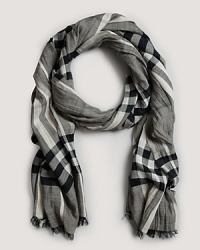 Soft, shadowy shades in a classic Burberry check keep you warm and stylish.