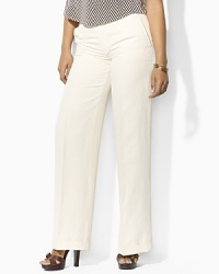 The Andover pant is designed in elegant wool crepe with a chic wide leg for an ultra-feminine silhouette. The Andover pant is designed in elegant wool crepe with a chic wide leg for an ultra-feminine silhouette.