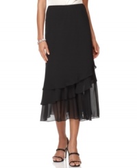 When paired with a sparkly shoe and a shimmery top, the sheer tiers of this Alex Evenings skirt will make you feel like the belle of the ball. When paired with a sparkly shoe and a shimmery top, the sheer tiers of this Alex Evenings skirt will make you feel like the belle of the ball.