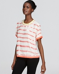 Light things up in a sequin stripe Madison Marcus top alive with color and touting sheer texture. A neon trim at the neckline lends a flash of fashion-forward appeal and a back keyhole opening finishes with a playful touch. Light things up in a sequin stripe Madison Marcus top alive with color and touting sheer texture. A neon trim at the neckline lends a flash of fashion-forward appeal and a back keyhole opening finishes with a playful touch.