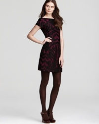 A lace overlay brings luxe texture and statement style to this richly hued Nanette Lepore dress. Team with heels for fall party perfection. A lace overlay brings luxe texture and statement style to this richly hued Nanette Lepore dress. Team with heels for fall party perfection.