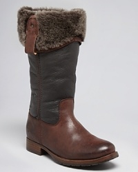 With a plush shearling lining, Frye's two-tone Melissa boots lend cozy comfort with Western influence. With a plush shearling lining, Frye's two-tone Melissa boots lend cozy comfort with Western influence.