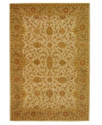 A beautifully balanced vine-and-blossom motif is captured in hushed ivory tones on this awe-inspiring area rug from Safavieh. Tufted in India from pure wool, this rug emerges from the annals of antiquity to bring spectacular style and time-honored quality to your home. (Clearance) A beautifully balanced vine-and-blossom motif is captured in hushed ivory tones on this awe-inspiring area rug from Safavieh. Tufted in India from pure wool, this rug emerges from the annals of antiquity to bring spectacular style and time-honored quality to your home. (Clearance)