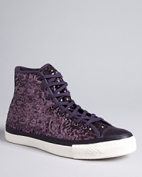 Converse devotees, don't miss these wow high tops with glimmering sequined uppers and smoothly polished leather cap toes. They're an athletic-meets-fashion must. Converse devotees, don't miss these wow high tops with glimmering sequined uppers and smoothly polished leather cap toes. They're an athletic-meets-fashion must.