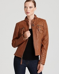 Rev up your wardrobe with this edgy leather motorcycle jacket, embellished with chic, authentic moto details for downtown style. Rev up your wardrobe with this edgy leather motorcycle jacket, embellished with chic, authentic moto details for downtown style.