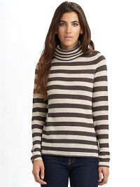 THE LOOKStriped throughoutTurtleneckPullover styleLong sleevesTHE FITAbout 23 from shoulder to hemTHE MATERIALCashmereCARE & ORIGINDry cleanImported