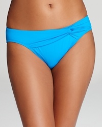 This Tommy Bahama bikini bottom offers full seat coverage so you can look great and feel secure for a flawless day at the beach! This Tommy Bahama bikini bottom offers full seat coverage so you can look great and feel secure for a flawless day at the beach!