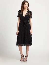 Delicate floral lace, tailored in a feminine silhouette and finished with a satin sash.V necklineShort sleevesSatin sashConcealed side zipSlip liningAbout 30 from natural waistPolyesterDry cleanMade in USA of imported fabricModel shown is 5'11 (180cm) wearing US size Small. Delicate floral lace, tailored in a feminine silhouette and finished with a satin sash.V necklineShort sleevesSatin sashConcealed side zipSlip liningAbout 30 from natural waistPolyesterDry cleanMade in USA of imported fabricModel shown is 5'11 (180cm) wearing US size Small.