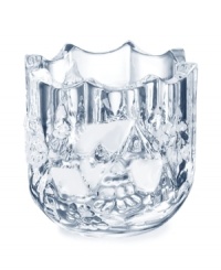 Like a beautiful ice sculpture, this Winter Wonderland votive holder depicts a cozy cottage surrounded by snow-covered trees in twinkling clear glass. A gift to cherish from Celebrations by Mikasa. Like a beautiful ice sculpture, this Winter Wonderland votive holder depicts a cozy cottage surrounded by snow-covered trees in twinkling clear glass. A gift to cherish from Celebrations by Mikasa.