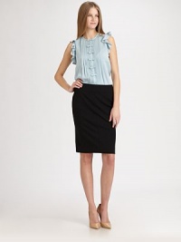 Sweet bows line the front of this pleated blouse, with ruffled overlay for a feminine appeal. JewelneckSleeveless with ruffled overlayButton front with hidden placketAbout 24 from shoulder to hem95% silk/5% spandexDry cleanImportedModel shown is 5'11 (180cm) wearing US size 4. Sweet bows line the front of this pleated blouse, with ruffled overlay for a feminine appeal. JewelneckSleeveless with ruffled overlayButton front with hidden placketAbout 24 from shoulder to hem95% silk/5% spandexDry cleanImportedModel shown is 5'11 (180cm) wearing US size 4.