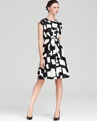 Go bold in black and white with this kate spade new york dress, touting an oversized, graphic print for a strong feminine statement. Polish off the look with sleek pumps and a slash of lipstick. Go bold in black and white with this kate spade new york dress, touting an oversized, graphic print for a strong feminine statement. Polish off the look with sleek pumps and a slash of lipstick.