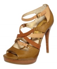A medley of leather straps in different hues gives the MICHAEL by Michael Kors's Cindy sandals a decidedly vintage feel. A medley of leather straps in different hues gives the MICHAEL by Michael Kors's Cindy sandals a decidedly vintage feel.