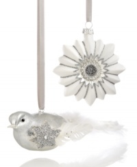 Sparkling silver birds with feather tails and frosted white snowflakes shining with silver glitter transform your tree with enchanting elegance. Sparkling silver birds with feather tails and frosted white snowflakes shining with silver glitter transform your tree with enchanting elegance.