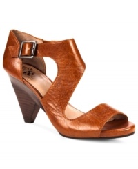 Angular cutouts give Vince Camuto's Pacley sandals a uniquely trendy look. A small heel adds height, but keeps things walkable. Angular cutouts give Vince Camuto's Pacley sandals a uniquely trendy look. A small heel adds height, but keeps things walkable.