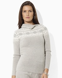 The perennially stylish Fair Isle sweater in an impossibly soft wool-angora blend gets a glamorous update with glittering jeweled buttons at the neckline.