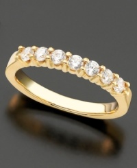 Timeless sparkle and classic design. This ring features seven round-cut diamonds (1/2 ct. t.w.) set in 14k gold. Timeless sparkle and classic design. This ring features seven round-cut diamonds (1/2 ct. t.w.) set in 14k gold.