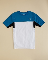 PUMA's stays on trend with this cool colorblock tee, designed for modern, high-performance style and comfort. PUMA's stays on trend with this cool colorblock tee, designed for modern, high-performance style and comfort.