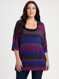 Classic stripes in updated hues give this relaxed-fit tunic instant appeal. You will be a fan of the three-quarter sleeves offering stylish arm coverage.ScoopneckDolman sleevesAllover printPull-on styleAbout 30 from shoulder to hemRayonMachine washMade in USA Classic stripes in updated hues give this relaxed-fit tunic instant appeal. You will be a fan of the three-quarter sleeves offering stylish arm coverage.ScoopneckDolman sleevesAllover printPull-on styleAbout 30 from shoulder to hemRayonMachine washMade in USA