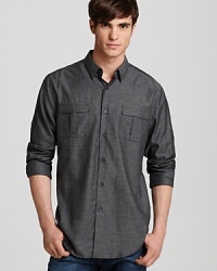 A handsome button-down from Elie Tahari modifies a military-inspired design for an innovative essential. A handsome button-down from Elie Tahari modifies a military-inspired design for an innovative essential.