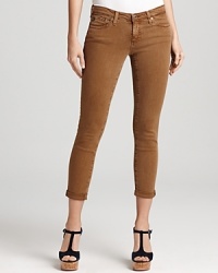Rendered in an earthy hue, these AG Adriano Goldschmied jeans feature a skinny silhouette and roll-up hems. Rendered in an earthy hue, these AG Adriano Goldschmied jeans feature a skinny silhouette and roll-up hems.