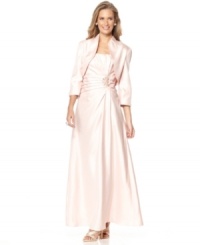 Jessica Howard's petite evening gown is adorned with a pleated, bead-embellished waistline and complemented by a cropped jacket with three-quarter sleeves. Jessica Howard's petite evening gown is adorned with a pleated, bead-embellished waistline and complemented by a cropped jacket with three-quarter sleeves.